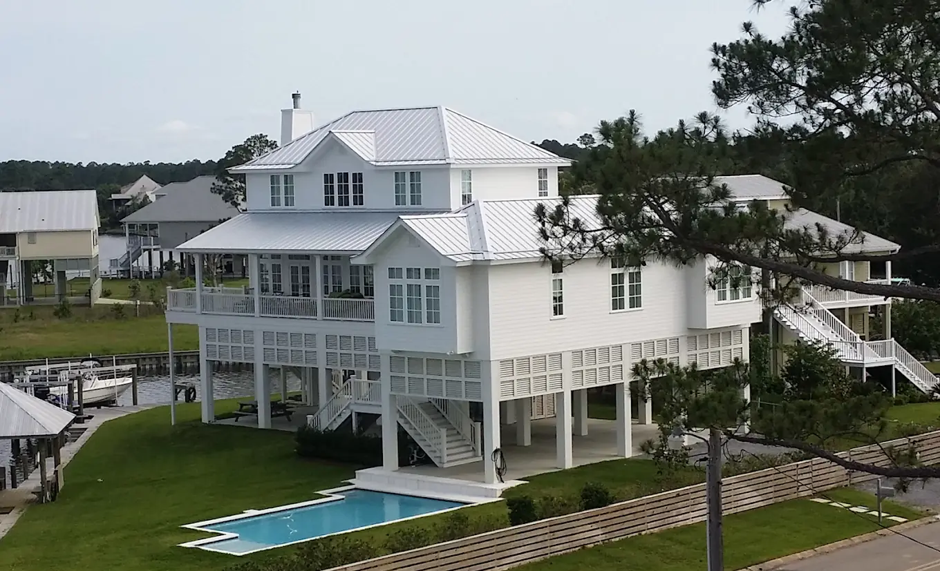 Elevated coastal home on the Mississippi Gulf Coast with a new roof by New Horizon Roofing