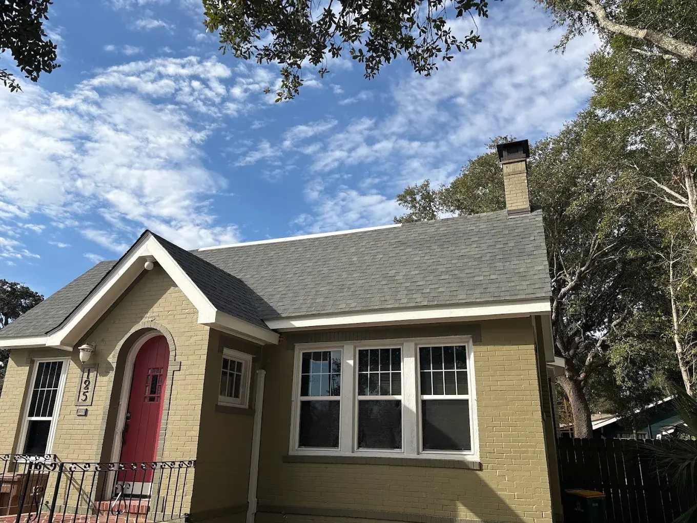 Cottage with new gutters and roofing
