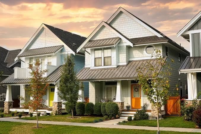 Modern homes with metal roof accents