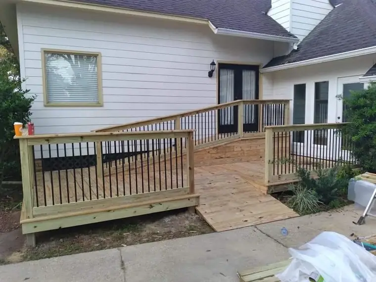 New deck, rail and trim work on a home exterior
