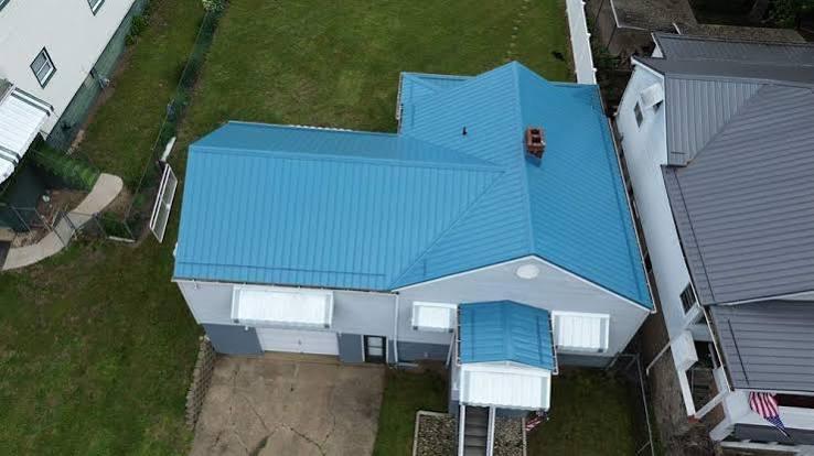 Bright blue metal roof seen from above