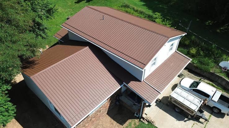 Dark bronze metal roof seen from a drone