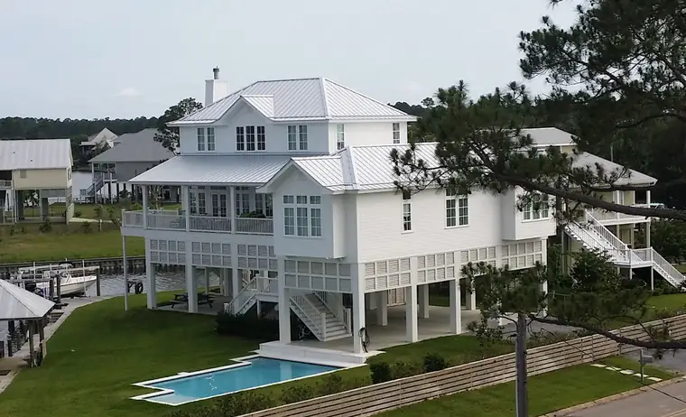 Elevated coastal home with a new roof, Gulf Coast Mississippi