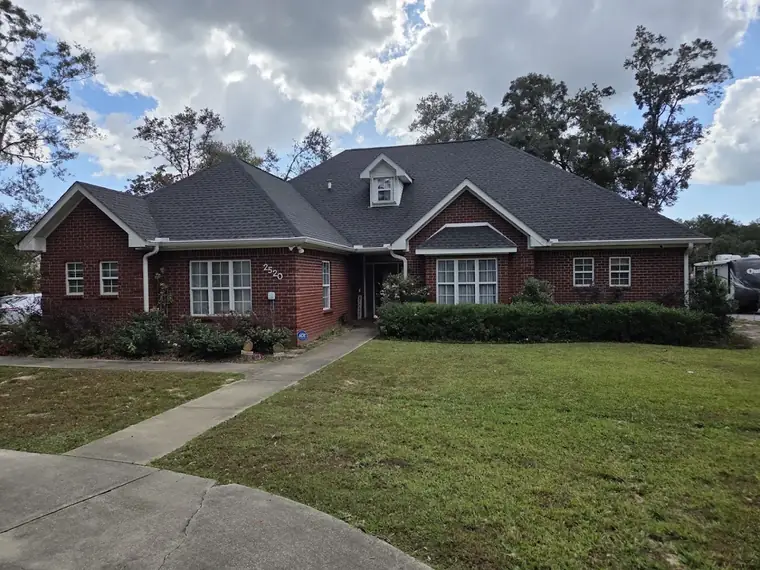 Brick ranch home with a new roof